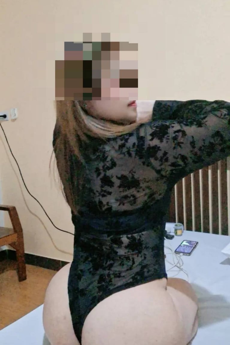 An older woman turns on the camera. - Sideline photo 20