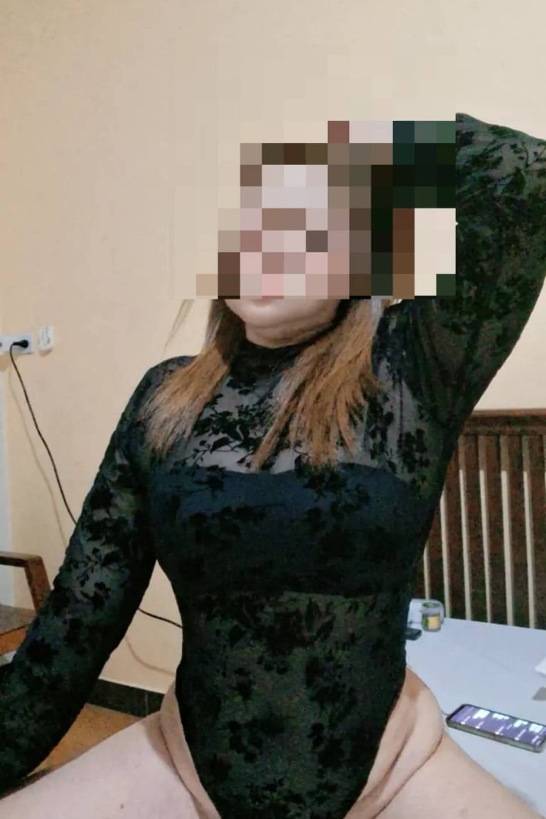 An older woman turns on the camera. - Sideline photo 22